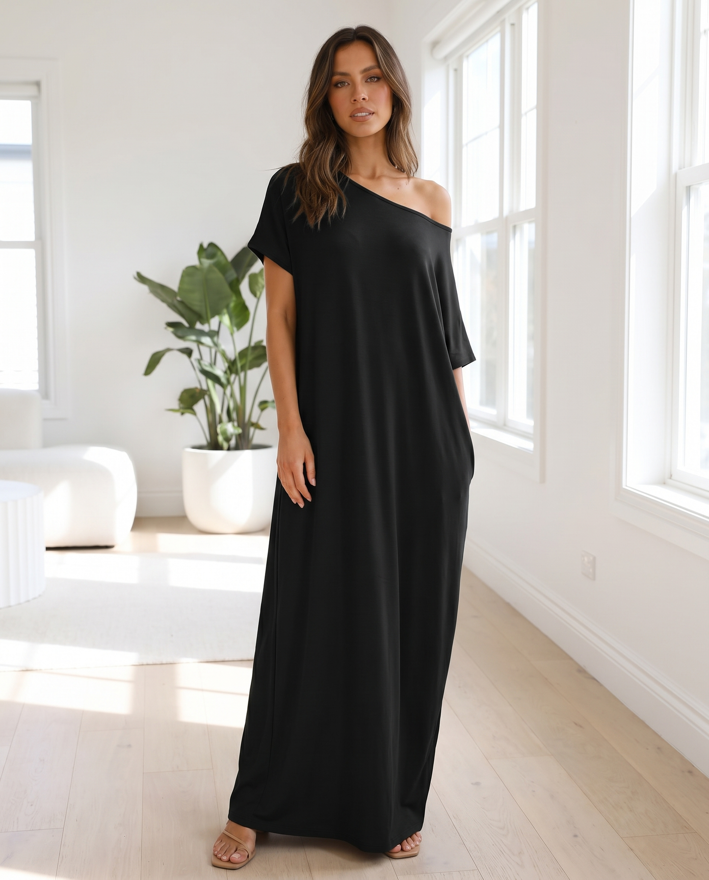 Vestido off-shoulder negro look